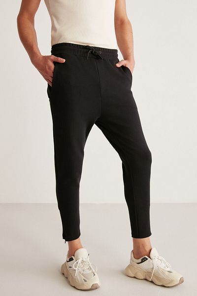GRIMELANGE Pánské technické tepláky Nıcolas ze silné pružné látky slim Fit černé s nohavičkami na zip