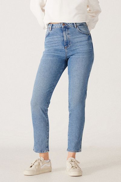 WRANGLER بنطلون جينز نسائي من قماش الدنيم ذو الخصر العالي وضيق الساق باللون الأزرق