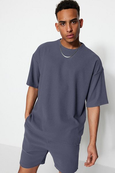 Trendyol Collection Indigo Oversize-T-Shirt mit Rundhalsausschnitt und kurzen Ärmeln, strukturiertes Ottoman-T-Shirt TMNSS23TS00081