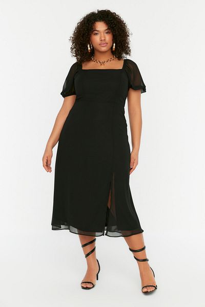 Trendyol Curve فستان أسود منسوج بفتحة TBBSS22AH0012